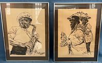Both framed jazz portrait prints side by side