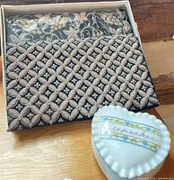 Bag, presentation box, and heart trinket box overall view