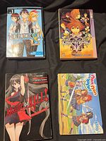 Group shot of all four manga volumes