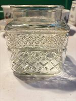 Front view of square Wexford glass canister showing diamond-cut pattern