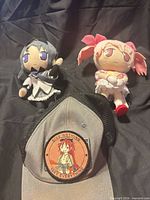 Overall lot with both plush dolls and hat