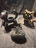 All three black cat items together