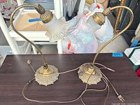Both Grandlite brass lily pad table lamps side by side showing overall design and condition