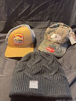 Group view of all three hats