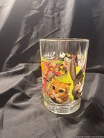 Front of glass showing Puss in Boots and Donkey graphics