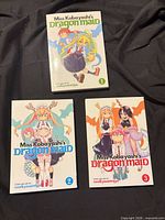 Front covers of volumes 1-3
