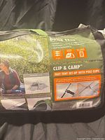 Carry bag front showing Clip & Camp branding and specs