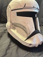 Front-angle view of weathered Republic Commando helmet