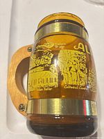 Front view showing graphics and amber glass body