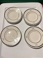 Four Studio Nova Exhibition saucers overview