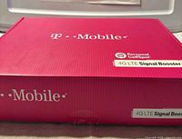 Closed magenta T-Mobile box showing product name