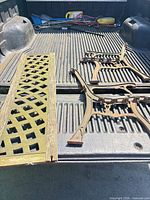 Bench ends and lattice backrest panel on truck bed