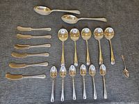 all 20 Birks flatware pieces arranged