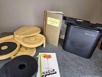 Overall lot showing glass rimmer, book, ice maker