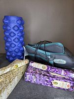 Group view of massager, foam roller and both incense packs