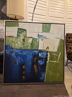 Front view of abstract painting showing colors and composition