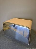 Front view showing pink body and chrome front door