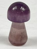Front view of polished amethyst crystal mushroom