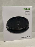 Front of retail box showing iRobot Roomba 694 image and branding