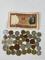 Group shot of banknote and coins