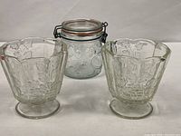 Lot overview showing both pedestal dishes and bail-wire jar