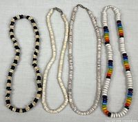 All four polished stone necklaces side by side