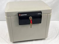 Front view of closed SentrySafe model 1170 with keys inserted