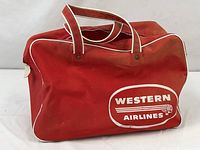 Front view showing logo, handles and zip