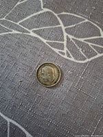 Obverse of 1912 silver threepence showing King George V