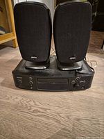 Front view of receiver with both speakers on top