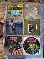 Front covers of all six LPs displayed