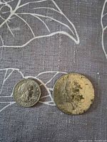 Obverse of 1979 Susan B. Anthony and Eisenhower dollars side by side