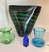 Group shot of four glass vases