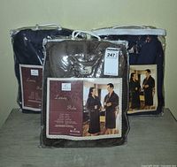 Front view of three packaged Kanata Home Collection Luxury Robes