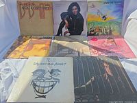 All eight LP sleeves front view