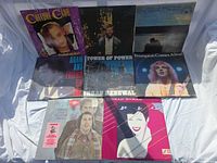 All eight LP covers displayed