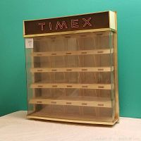 Front view showing Timex branding with multiple angled shelves inside clear plastic case