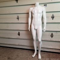 Full body image of white male mannequin standing headless without a base, showing overall shape and condition.