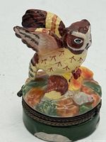 Front view of porcelain owl trinket box closed