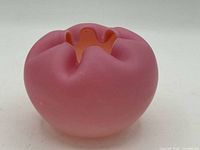 Full view of pink satin glass rose bowl vase front
