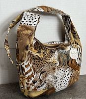 Exterior side showing cheetah motif and attached manufacturer tag