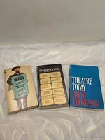 Front covers of all three theatre books