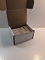 open box showing large quantity of cards stored upright