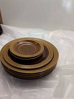 Stacked plates showing size gradation and rim design