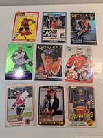 Nine cards laid out 3×3 showing full lot