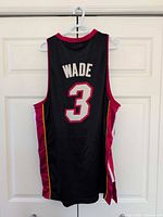 Back view showing WADE name and number 3