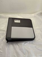 Closed Microsoft Certified Partner binder front view