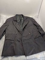 Full view of grey double-breasted blazer