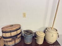 Group shot of four containers lined on table