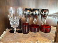 Group shot of all 11 drinkware pieces on shelf